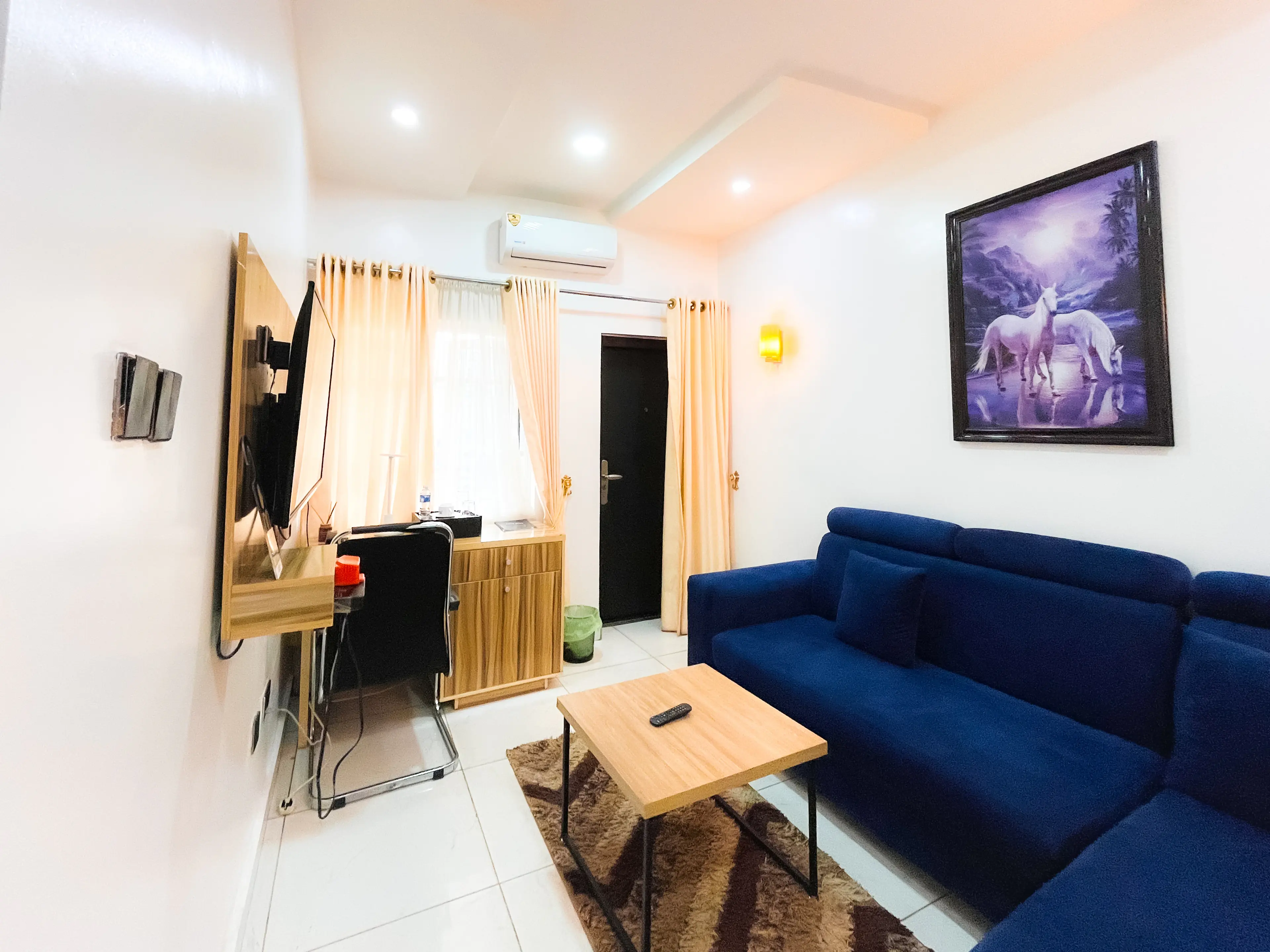 Living Area at SUITE in Apo Resettlement Zone A